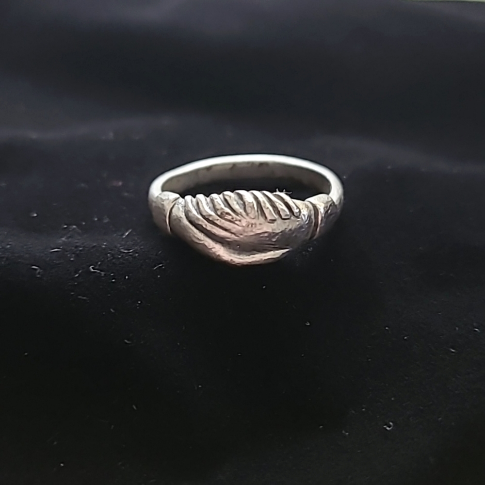 Rare Vintage James Avery holding hands ring